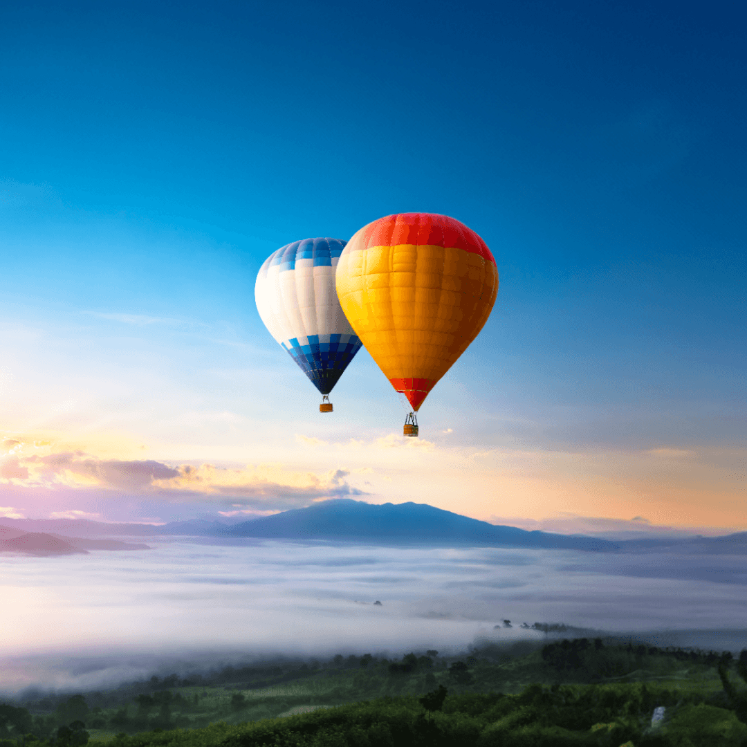 Hot air balloon over sea of mist